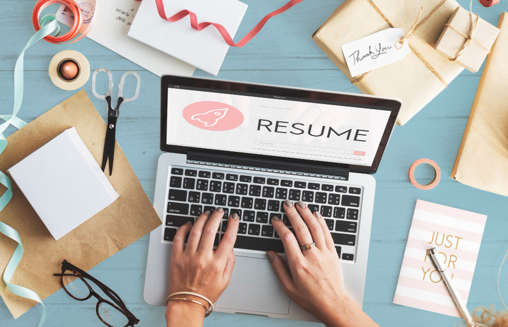 https://www.freepik.com/free-photo/rear-view-adult-man-searching-new-job-working-writing-his-resume-laptop_27999589.htm